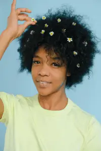 Woman with afro hair - boost hair growth