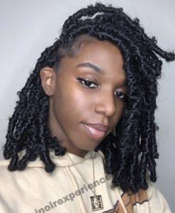 African American woman wearing distressed butterfly faux locs - Your Guide to Maintaining and Styling Locs