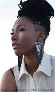 African-American woman wearing high top locs - Your guide to maintaining and styling locs